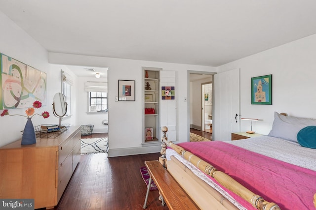 bedroom featuring dark wood-type flooring