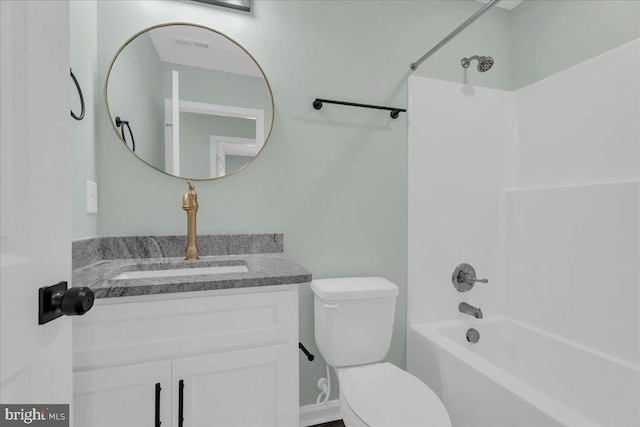 bathroom with toilet, visible vents, vanity, and bathing tub / shower combination