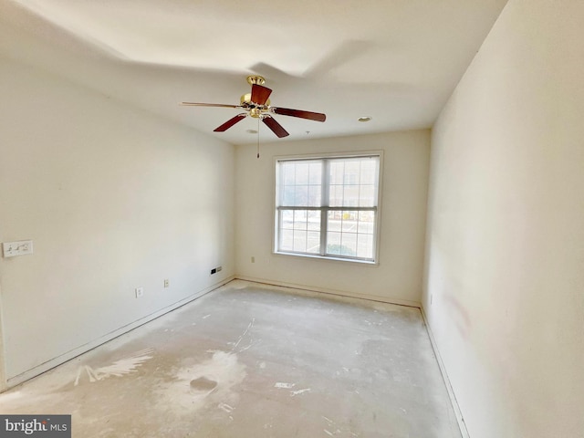 unfurnished room with a ceiling fan