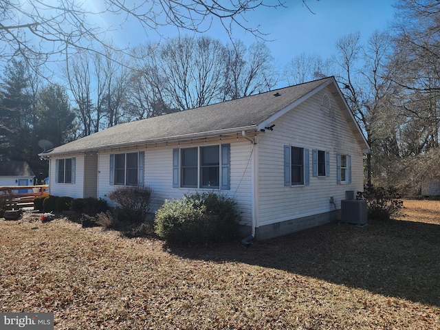 view of home's exterior with central AC