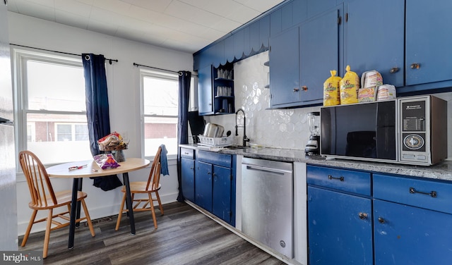 kitchen featuring blue cabinets, tasteful backsplash, dark wood-type flooring, and stainless steel dishwasher