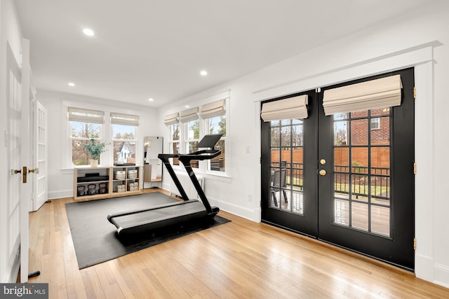 exercise area with recessed lighting, french doors, wood-type flooring, and baseboards