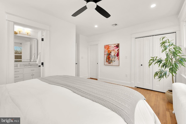 bedroom with baseboards, recessed lighting, visible vents, and light wood-style floors