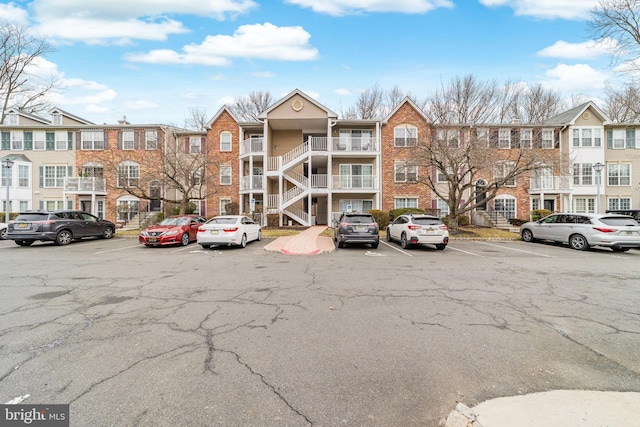 58 Chambord Ct, Hamilton, NJ 08619 - view of building exterior with uncovered parking