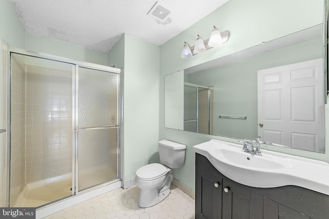 full bath featuring visible vents, a shower stall, and a textured ceiling