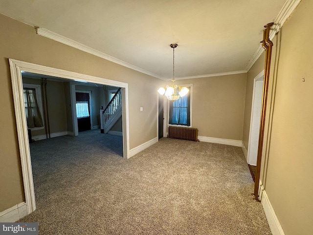 unfurnished dining area with carpet floors, crown molding, stairway, radiator heating unit, and a chandelier