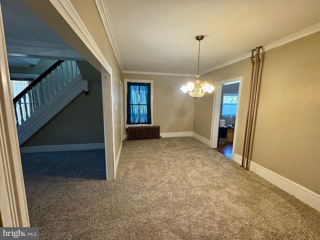 unfurnished dining area with ornamental molding, carpet flooring, stairway, and radiator heating unit