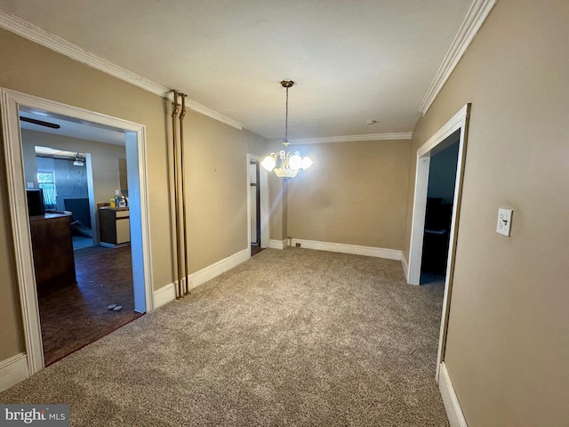 unfurnished dining area with a chandelier, carpet floors, ornamental molding, and baseboards