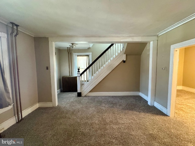 interior space with baseboards, radiator heating unit, stairs, crown molding, and carpet flooring