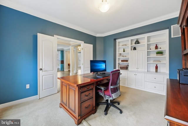 office area featuring light carpet, visible vents, ornamental molding, and baseboards