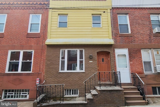 multi unit property featuring brick siding