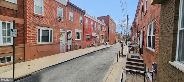 view of road featuring curbs and sidewalks