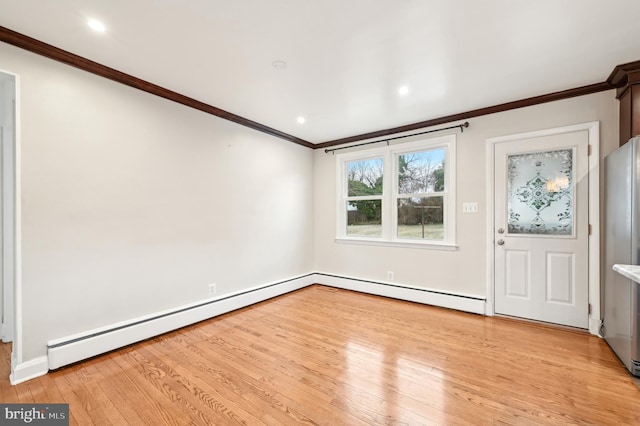 foyer entrance featuring ornamental molding, recessed lighting, light wood-style floors, and a baseboard radiator