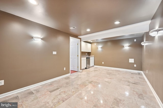 interior space featuring marble finish floor, visible vents, baseboards, and recessed lighting