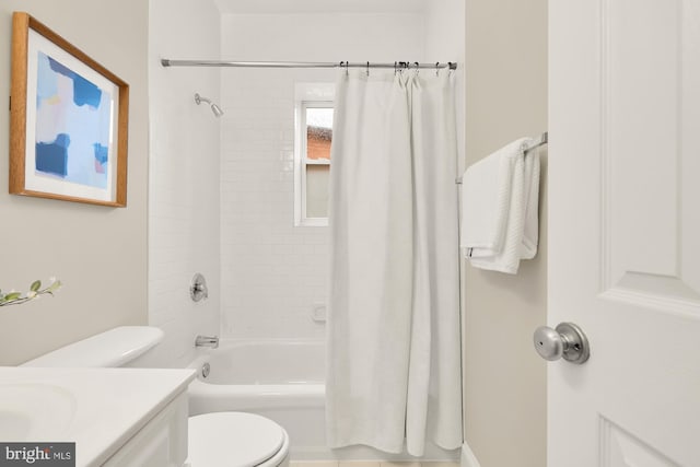 bathroom featuring vanity, toilet, and shower / bathtub combination with curtain