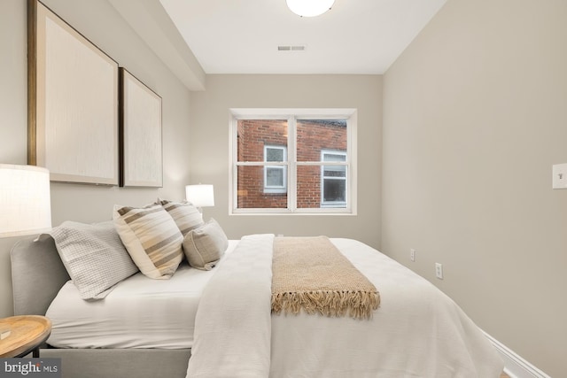 bedroom with visible vents