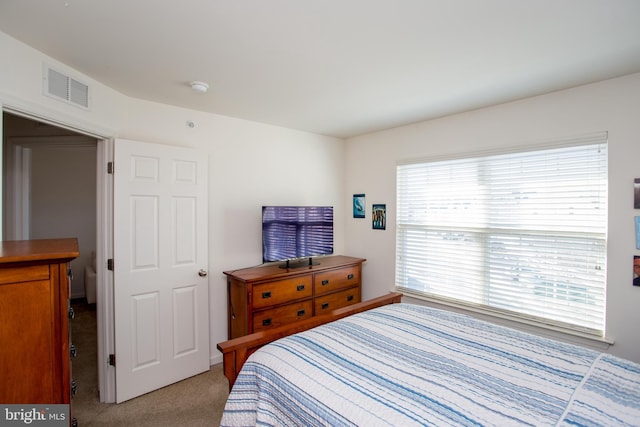 bedroom featuring carpet and visible vents