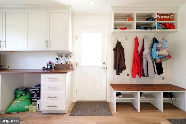 mudroom with light wood-style floors