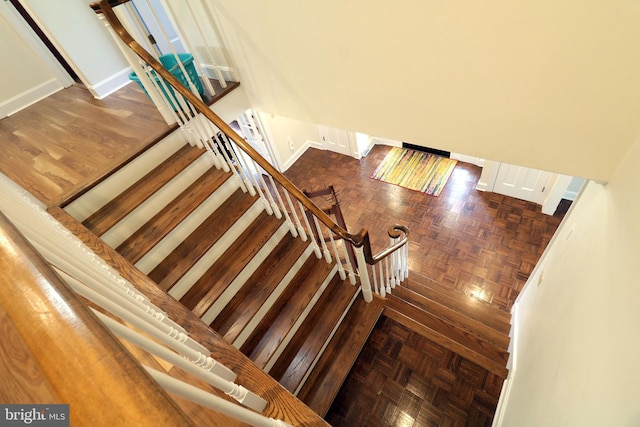 staircase with baseboards