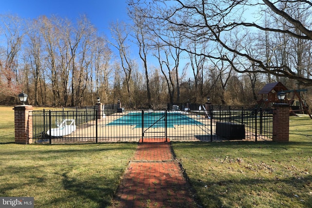 view of pool with a fenced in pool, playground community, fence, and a lawn