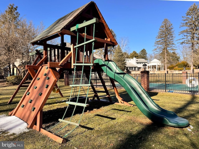 community jungle gym with fence