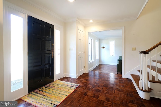 entryway with baseboards, stairway, recessed lighting, and crown molding