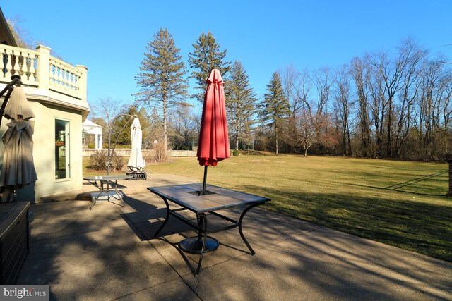 view of patio / terrace with a balcony