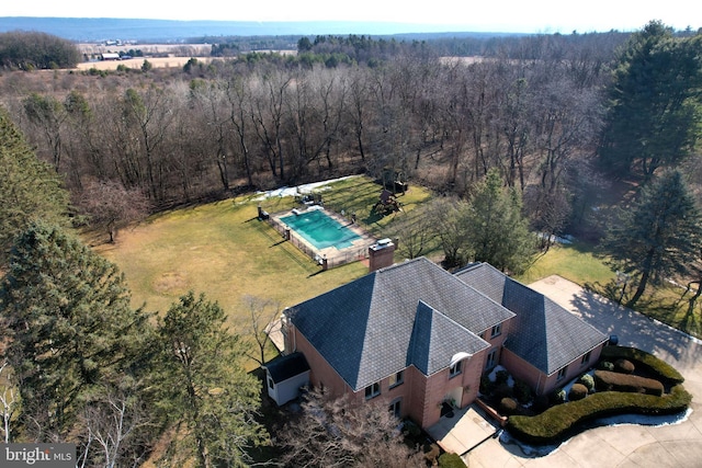 aerial view featuring a forest view