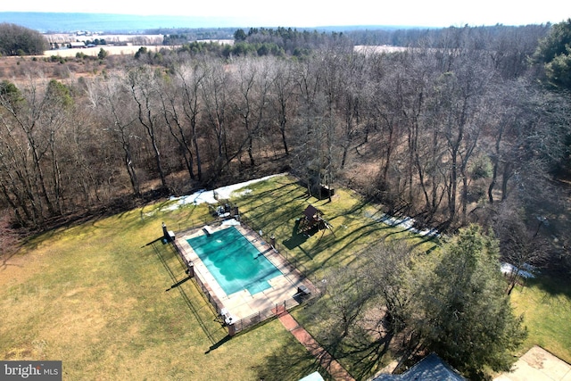 bird's eye view featuring a forest view