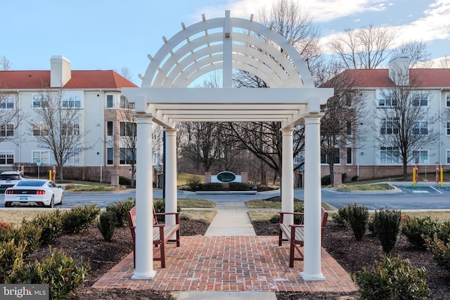 surrounding community featuring a pergola