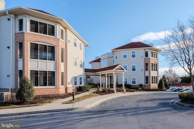 view of property with central AC unit