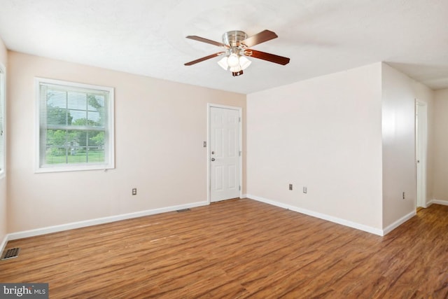 6621 Schoolhouse Rd, Bealeton, VA 22712 - empty room with wood finished floors, baseboards, and a ceiling fan