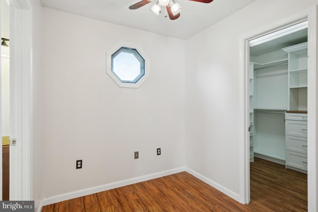 6621 Schoolhouse Rd, Bealeton, VA 22712 - unfurnished bedroom featuring a spacious closet, wood finished floors, a closet, and baseboards