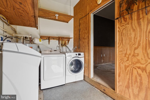 6621 Schoolhouse Rd, Bealeton, VA 22712 - laundry room with washer and clothes dryer, carpet, water heater, and wood walls