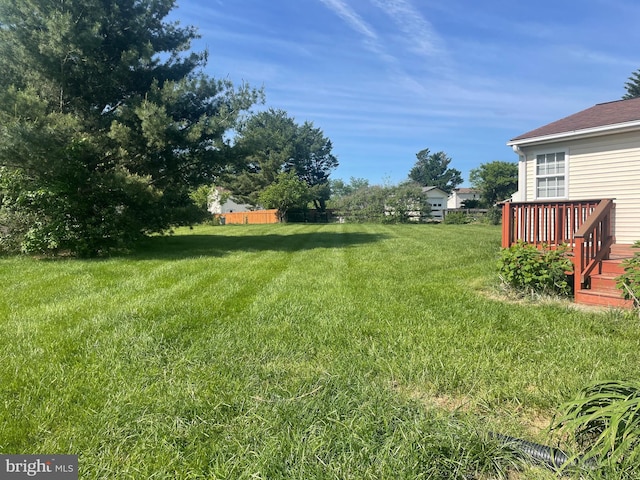 6621 Schoolhouse Rd, Bealeton, VA 22712 - view of grassy yard featuring a wooden deck