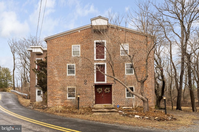 view of building exterior with entry steps