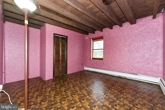 unfurnished room featuring baseboard heating, beamed ceiling, and wood ceiling