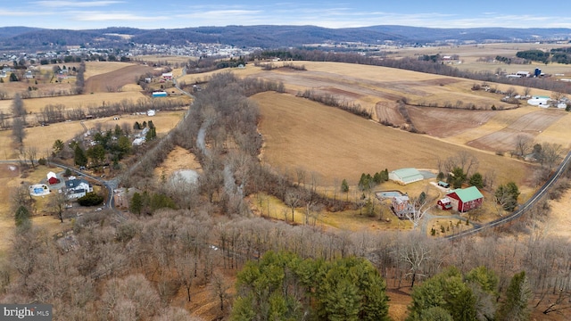 bird's eye view featuring a rural view and a mountain view