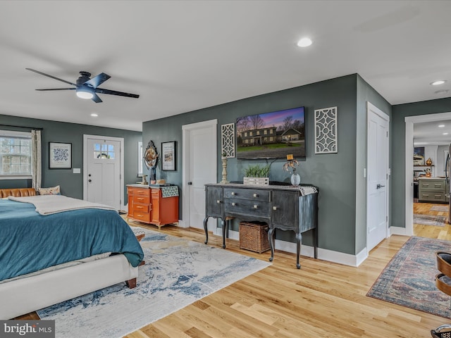 bedroom with ceiling fan, recessed lighting, wood finished floors, and baseboards