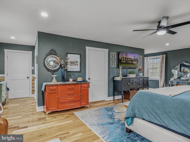 bedroom featuring recessed lighting, light wood-style flooring, and baseboards