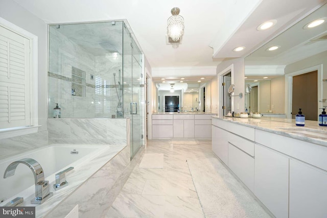 bathroom with vanity, marble finish floor, ornamental molding, a marble finish shower, and a bath