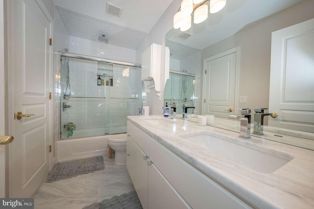 bathroom with visible vents, a sink, and double vanity