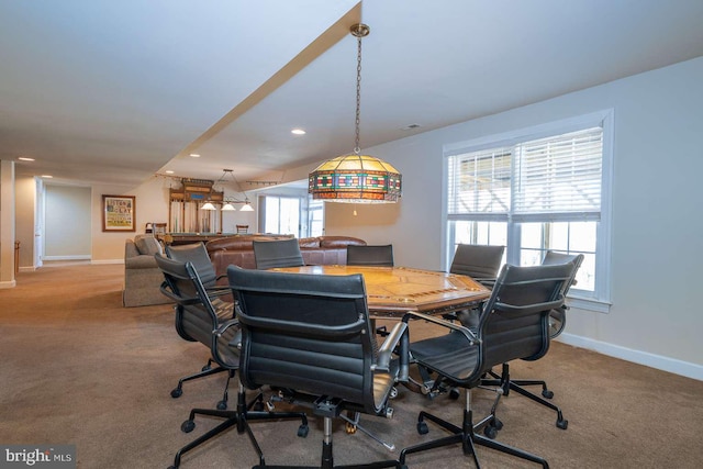 carpeted dining area featuring recessed lighting, visible vents, and baseboards