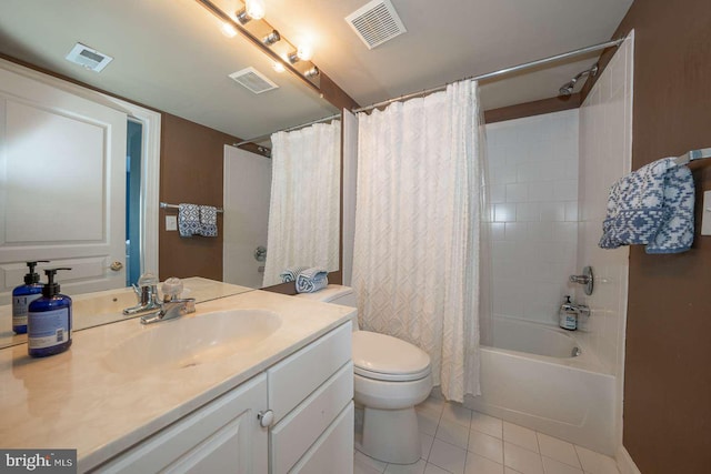 bathroom with tile patterned flooring, visible vents, and vanity