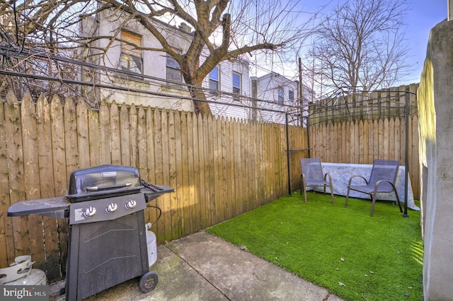 view of yard with a fenced backyard