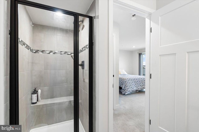 ensuite bathroom featuring a stall shower and ensuite bath