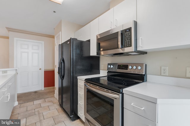 kitchen featuring white cabinetry, appliances with stainless steel finishes, and light countertops