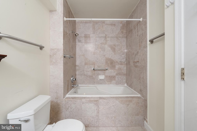 full bathroom featuring toilet and tiled shower / bath combo