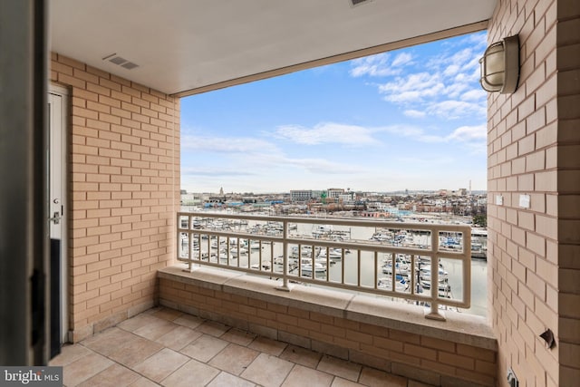 balcony featuring a view of city and visible vents