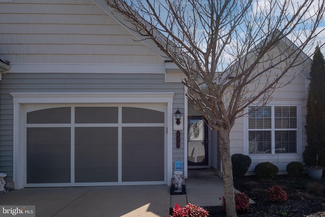 entrance to property featuring driveway